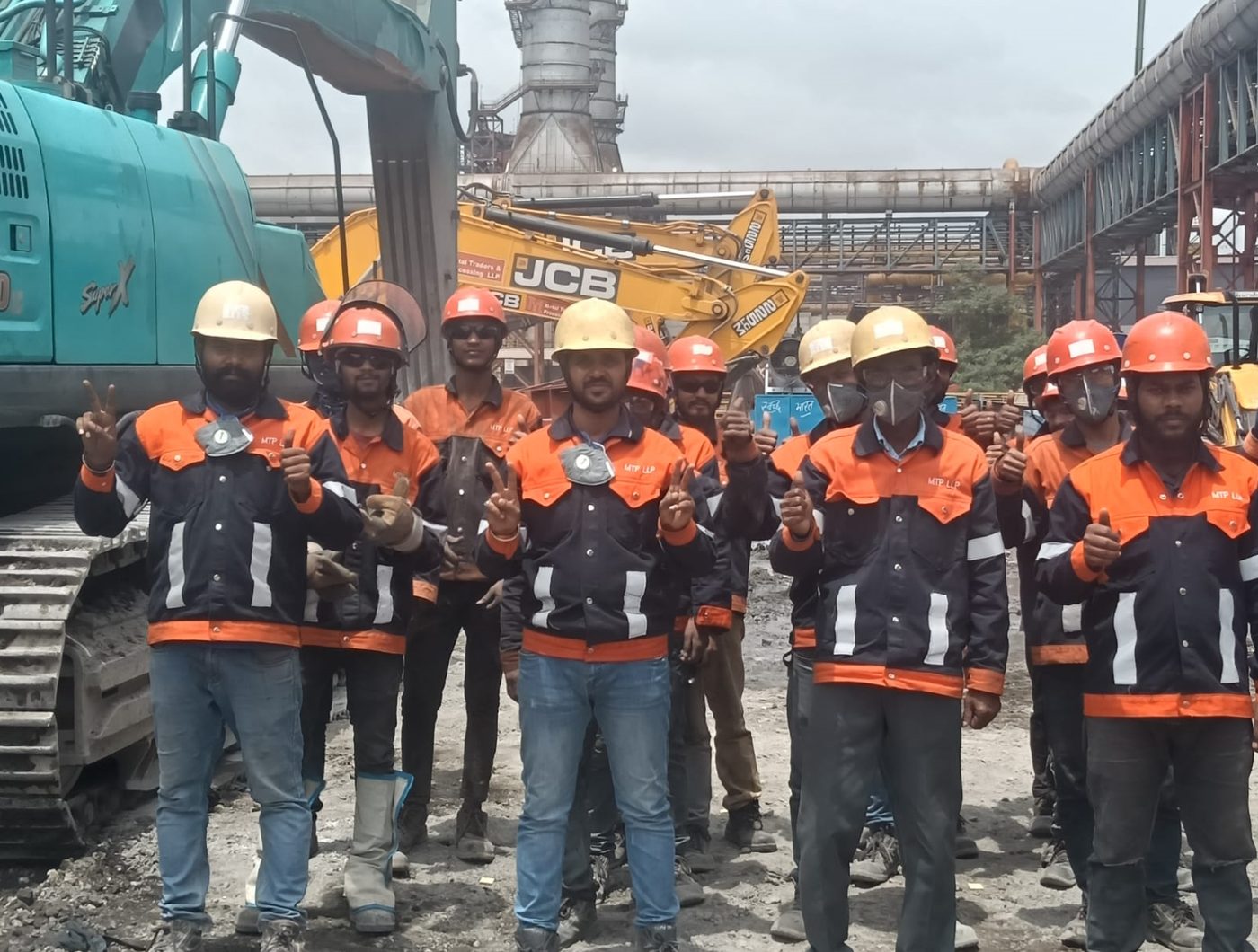 MTP personnel in full PPE at an operating steel plant